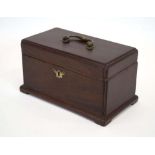 A Georgian mahogany tea caddy with a three-section interior and bracket feet, w.