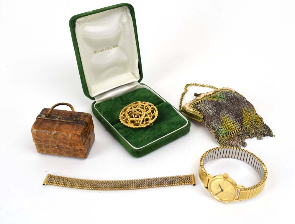 A small group of collectables including an inkwell in the form of a leather bag,