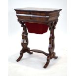 A Victorian flame mahogany sewing box with a rosewood and kingwood fitted interior on loose lyre