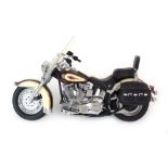 A Franklin Mint 1/10 scale Harley-Davidson Heritage Soft-Tail Classic motorcycle