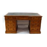 A Victorian oak twin-pedestal desk,