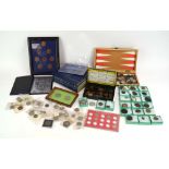 A group of coins including an 1889 crown, two 16th century silver coins, an 1891 half crown,