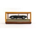 A Burago 1/18 scale 1961 Jaguar E-type, cased, case w.