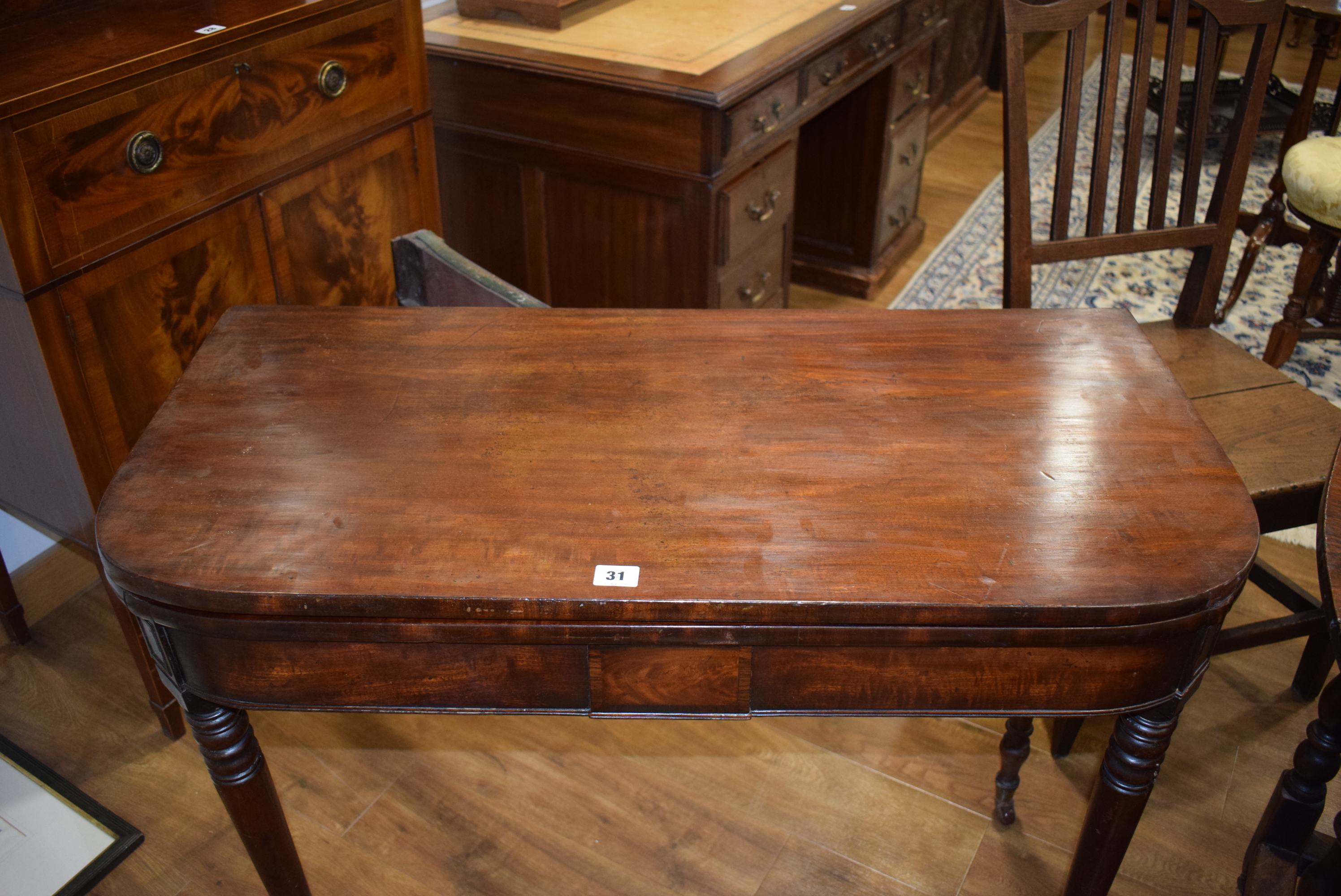 A George III mahogany tea table, the plain frieze over turned tapering legs with castors, w. - Image 7 of 18