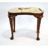 A Georgian-style beech and upholstered kidney shaped dressing stool