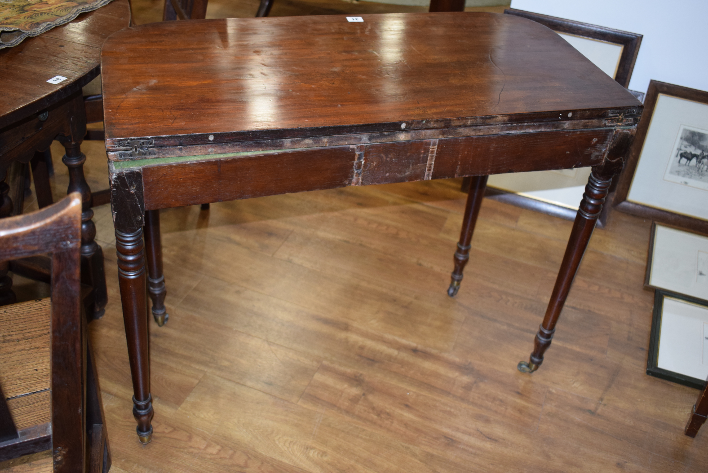 A George III mahogany tea table, the plain frieze over turned tapering legs with castors, w. - Image 5 of 18