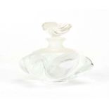 A Lalique scent bottle and stopper of stylised flowerhead form, h.