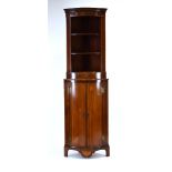 A Georgian mahogany and strung bow-fronted corner cabinet, the gallery over a drawer,