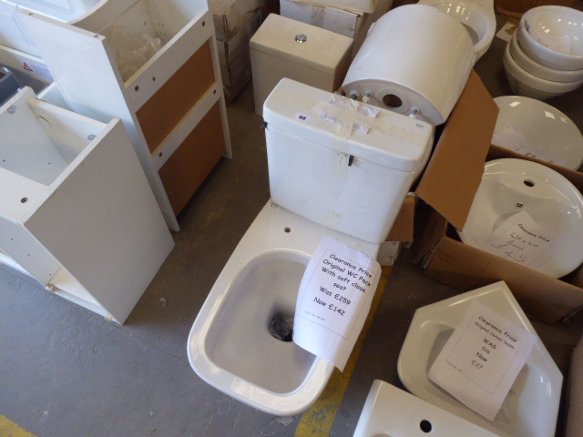 2 toilet pans each with cistern, single toilet pan, boxed bathroom cabinet, hand basin, half