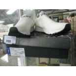 4 boxed pairs of DKNY white slip on trainers