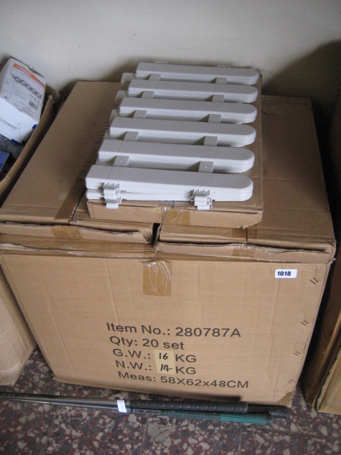 Box containing 20 sets of white plastic border edging fencing