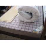 Brown double bed frame with Snugland mattress