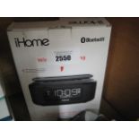 iHome bluetooth stereo speaker system with alarm clock and charging pad