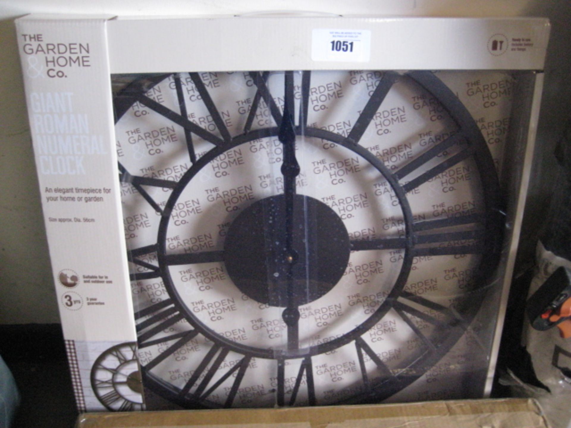 Giant Roman numeral garden clock