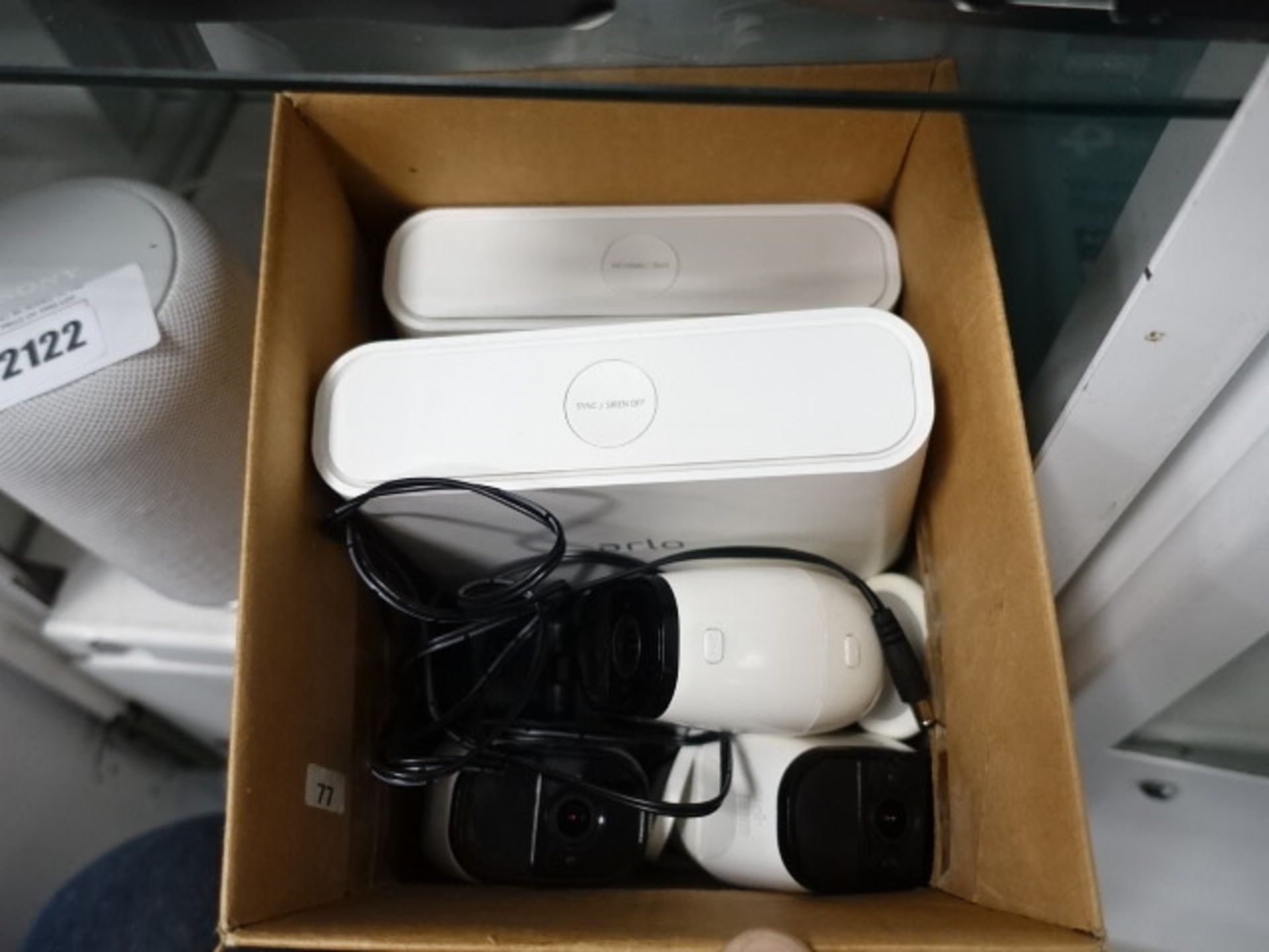 3 Arlo Netgear wifi cameras with batteries and 2 Arlo stations