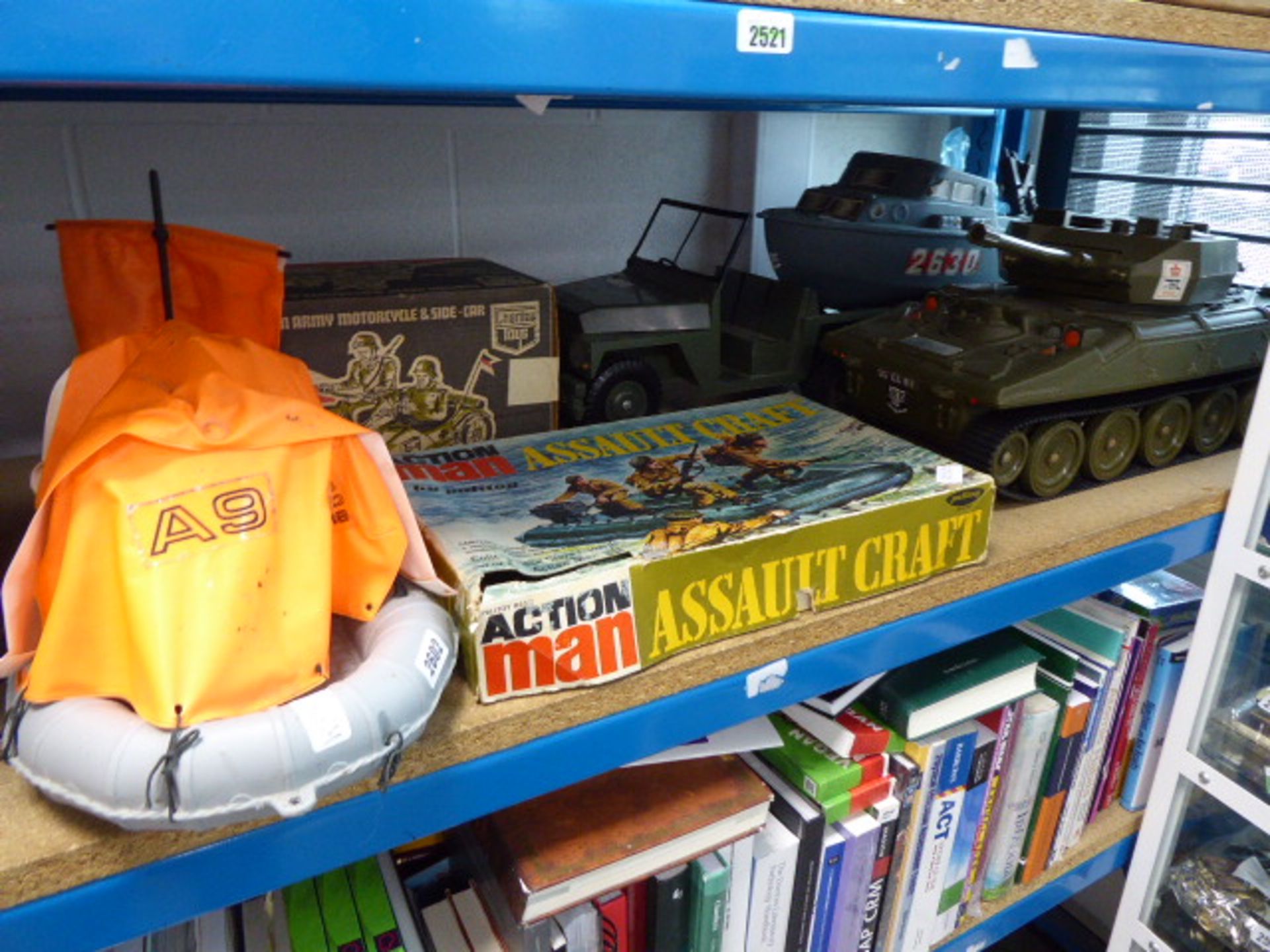 Selection of various Action Man vehicles including tank, boat, jeep, assault craft, etc