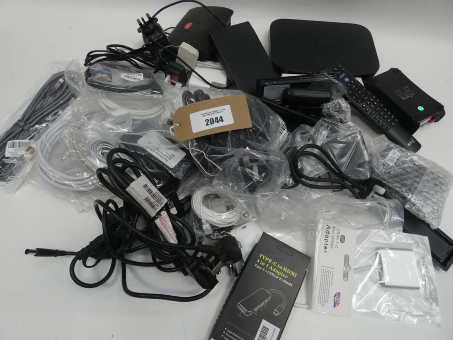 Bag containing quantity of various cables, leads, PSUs, adapters, hubs, mouse etc