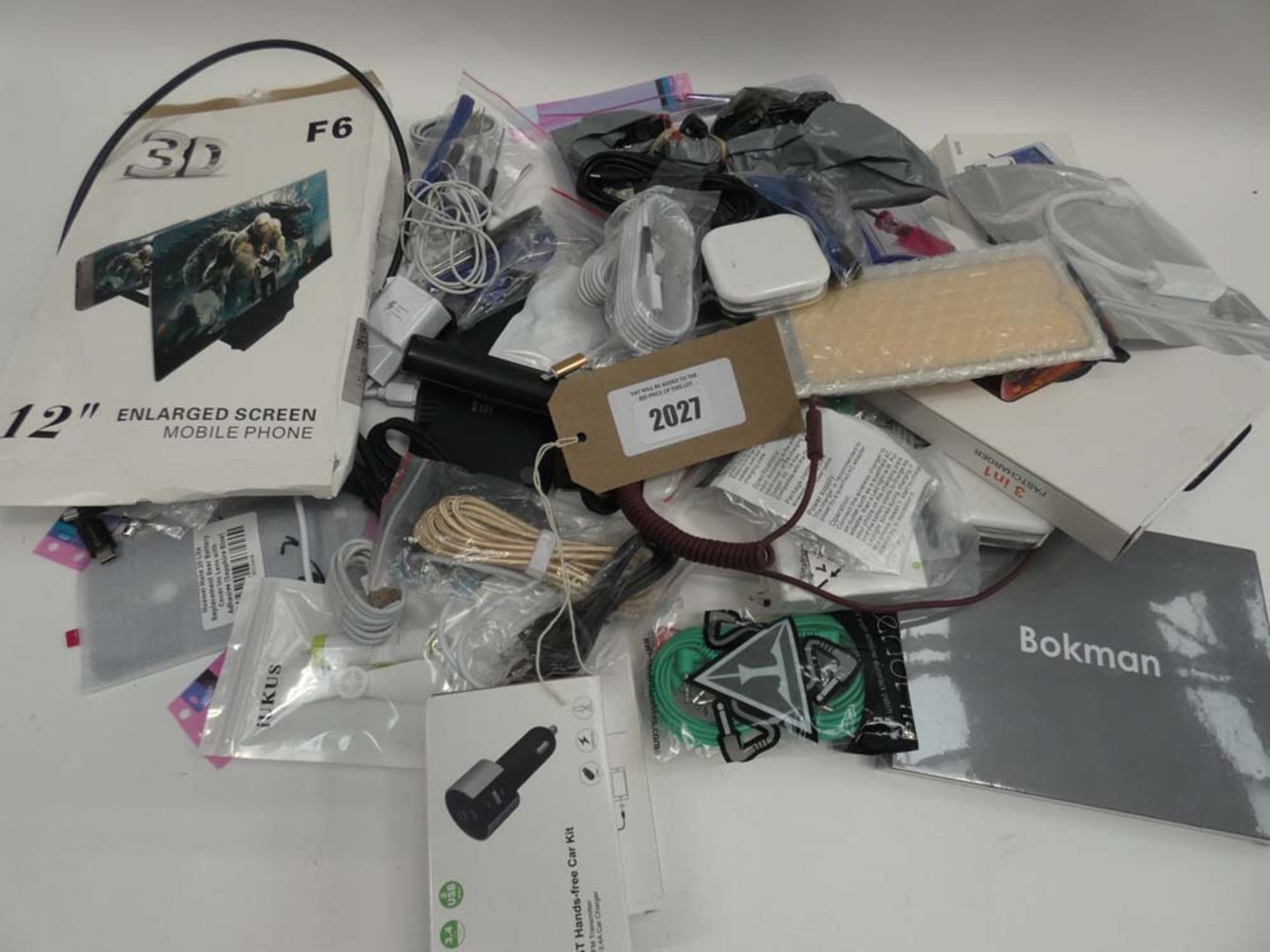 Bag containing quantity of various mobile phone accessories