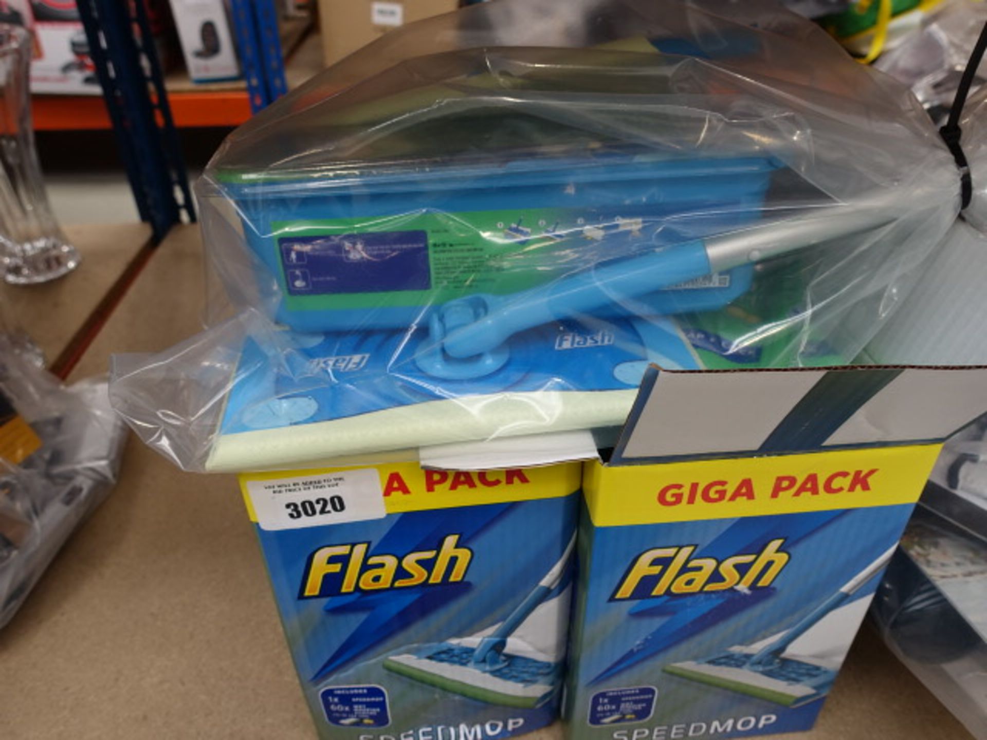 2 boxes and a bag containing Flash Speedmop wetwipes