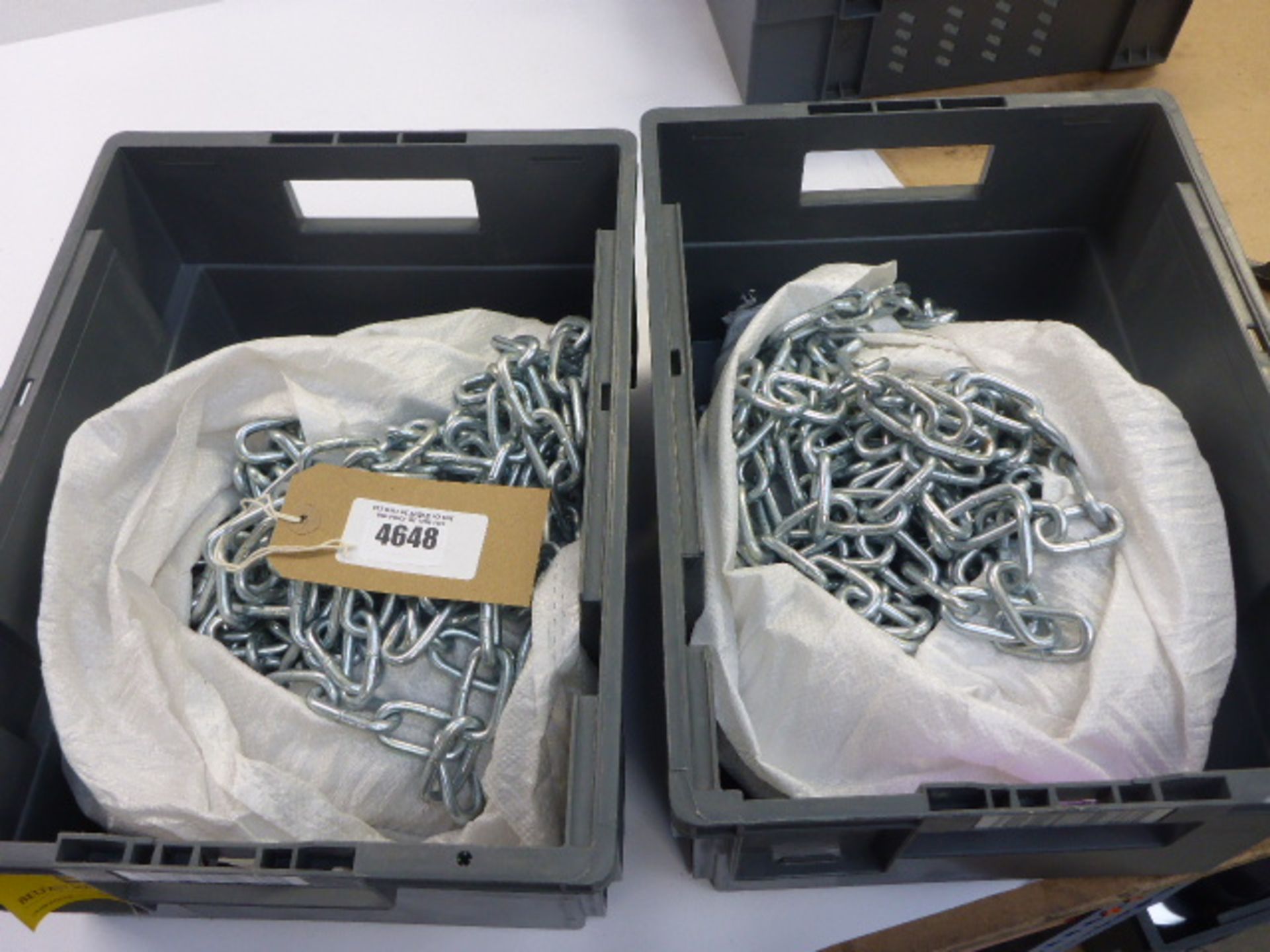 2 bags containing galvanized chains