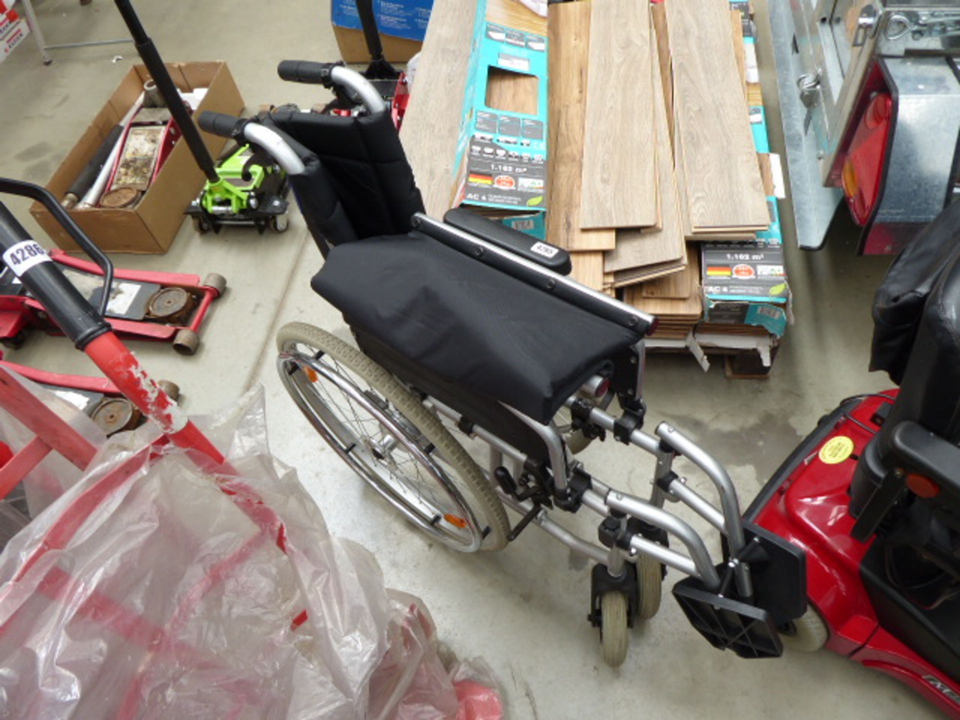 Large and small wheeled fold up wheelchair
