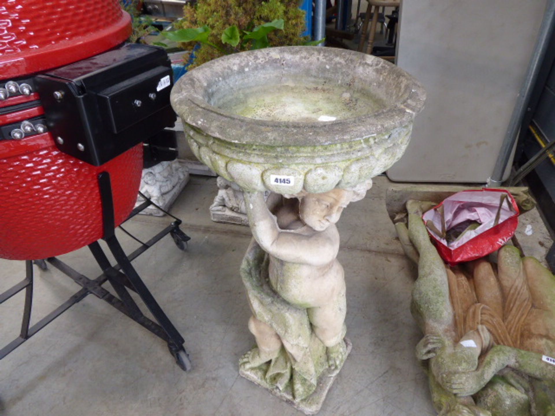 Stone cherub style water feature