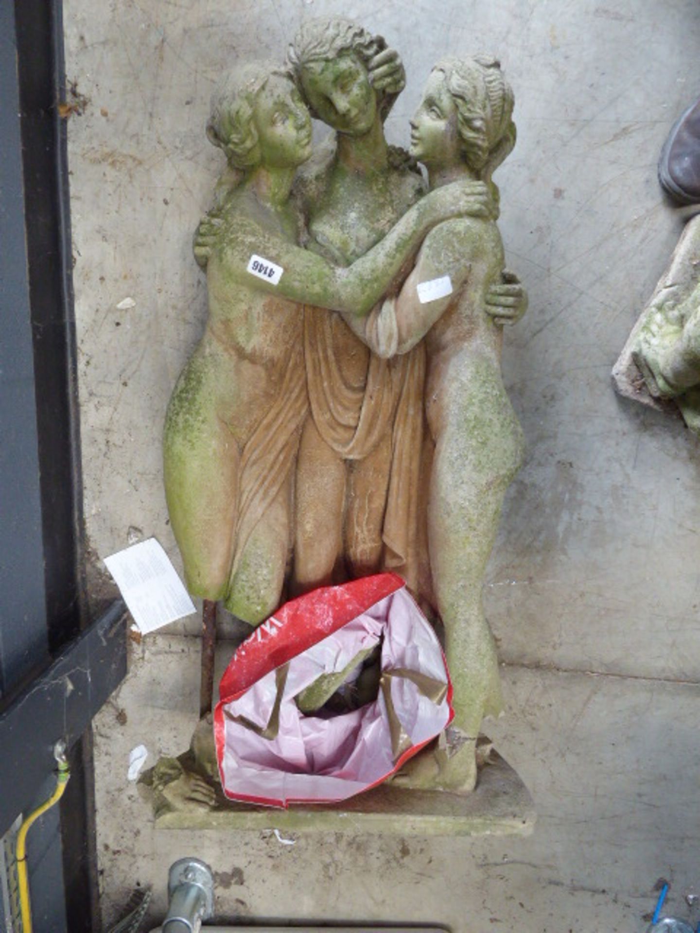 Statue of 3 ladies (broken legs)