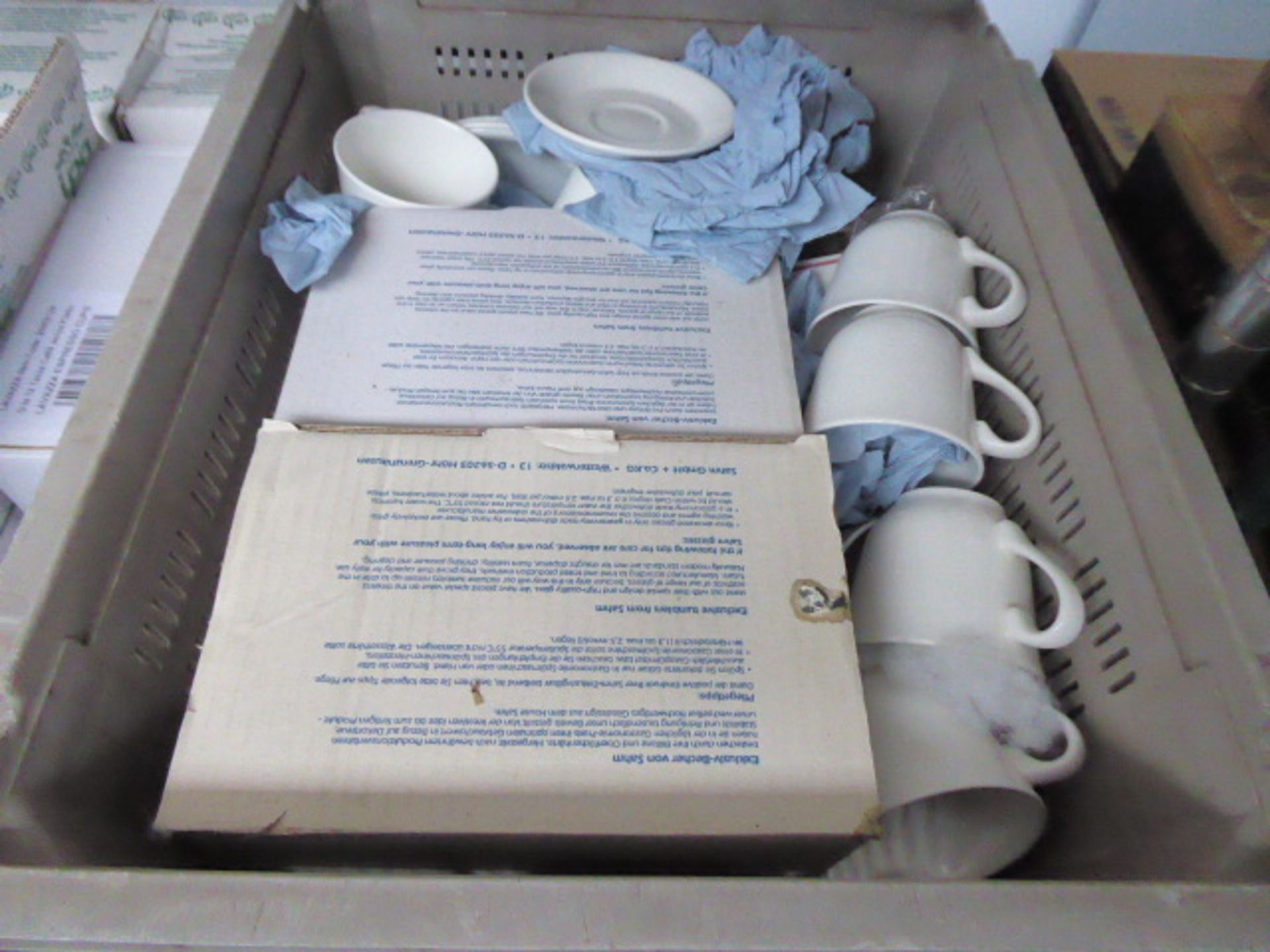 Shelf of assorted crockery including cups and a large number of saucers - Image 2 of 3