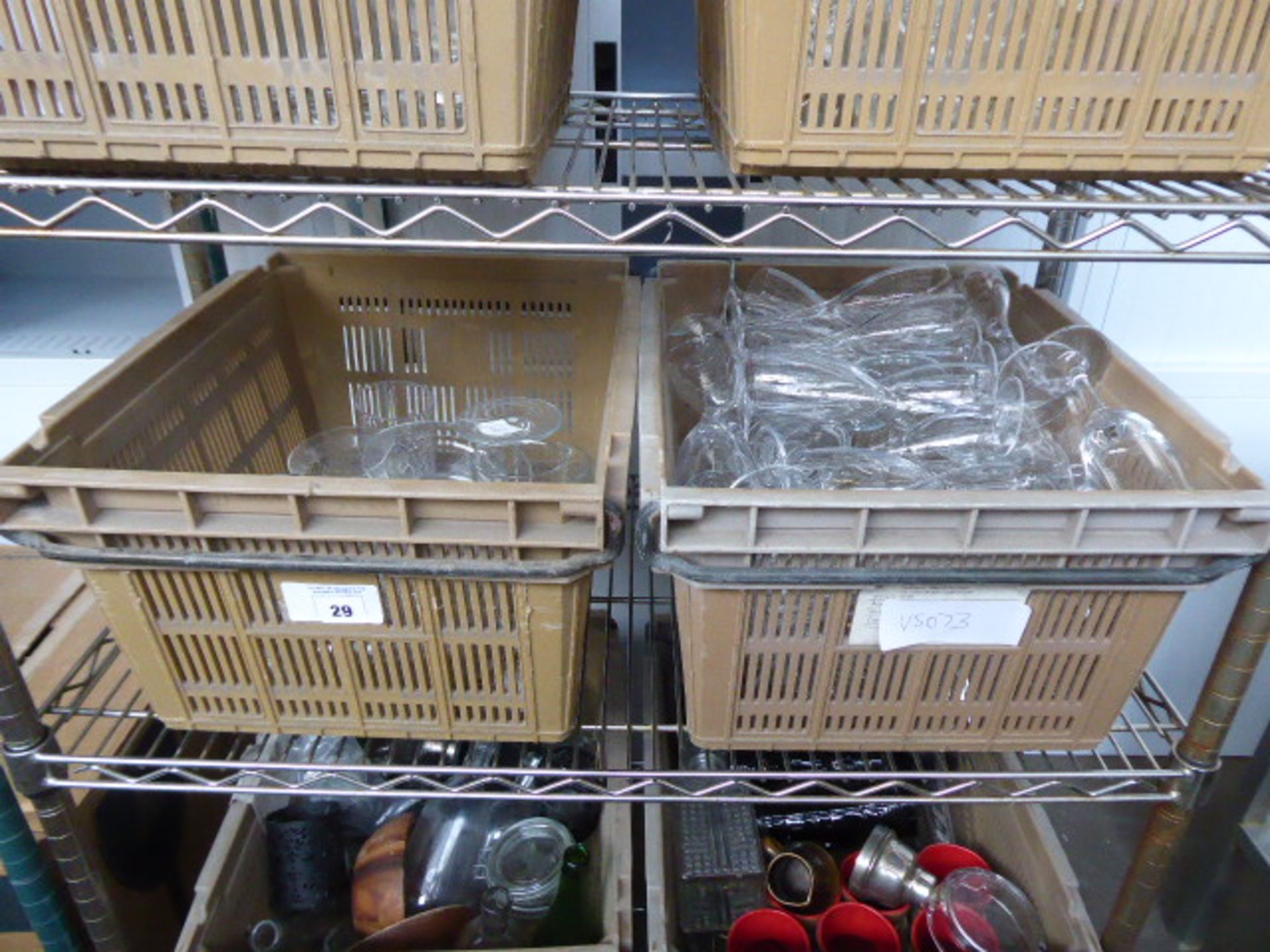 2 plastic stacking trays of assorted glassware