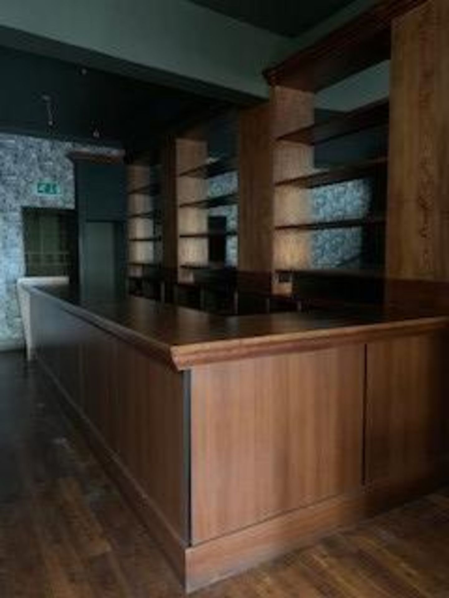 A large bespoke bar and back bar. The bar measuring approx. 5 m in length