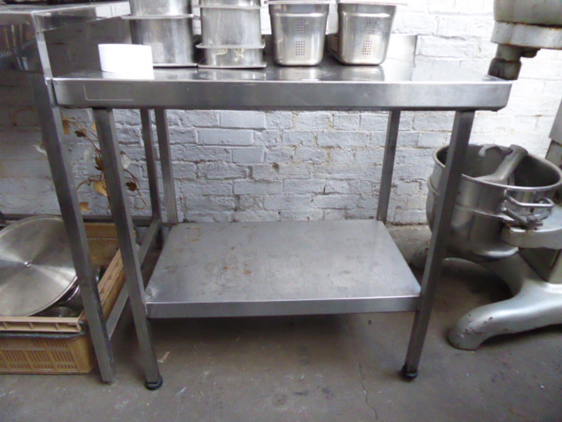 A 90cm stainless steel preparation table