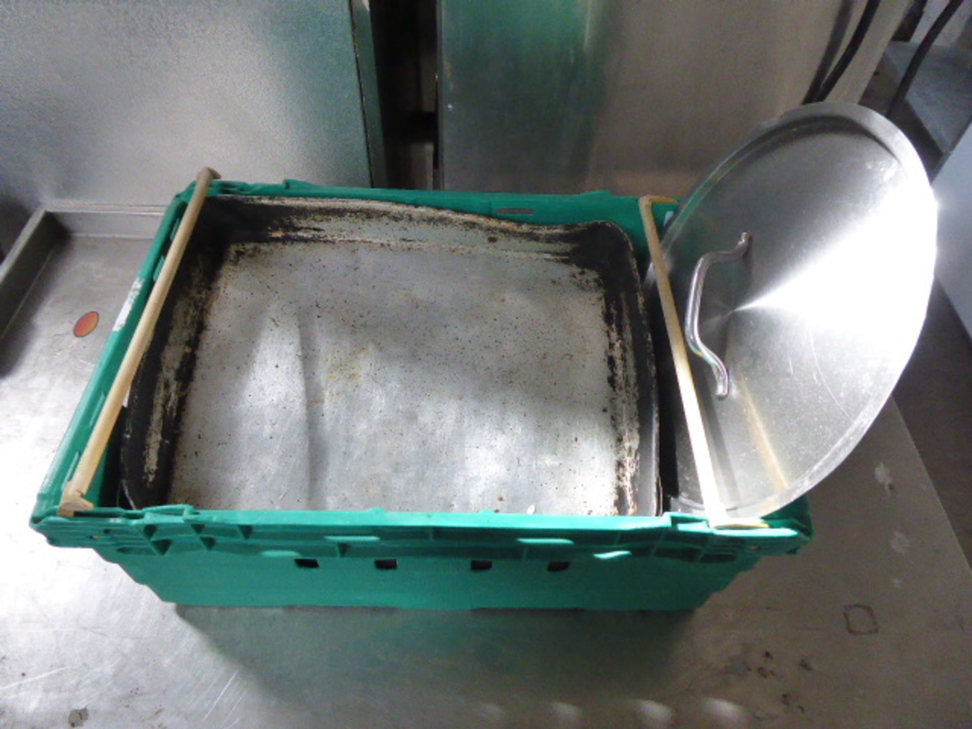 Stacking crate containing baking trays