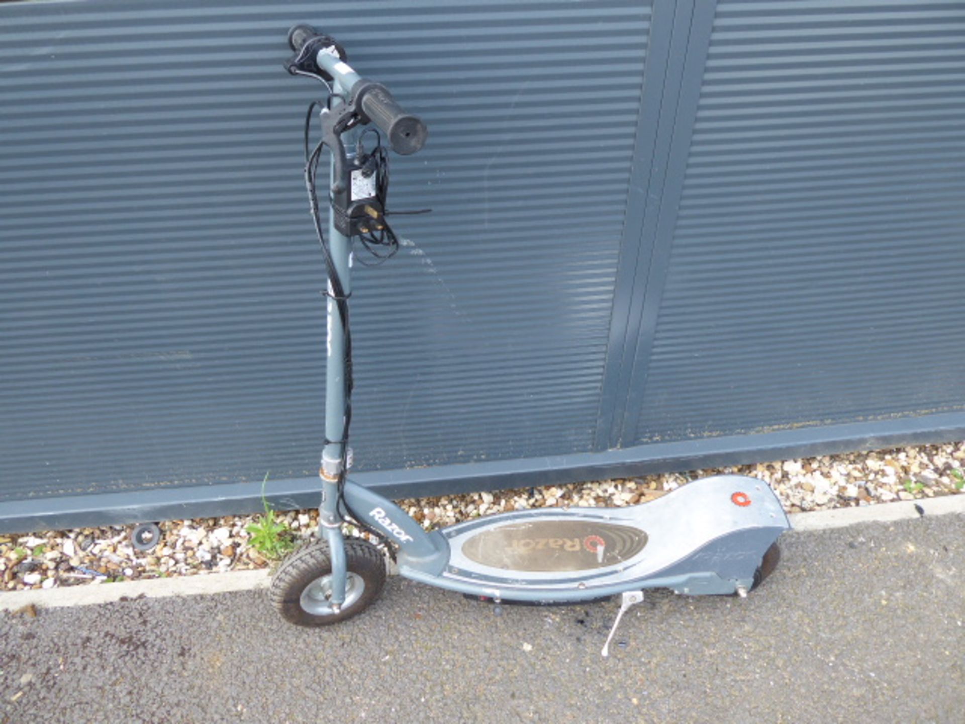 Silver wide plated razor electric scooter with charger