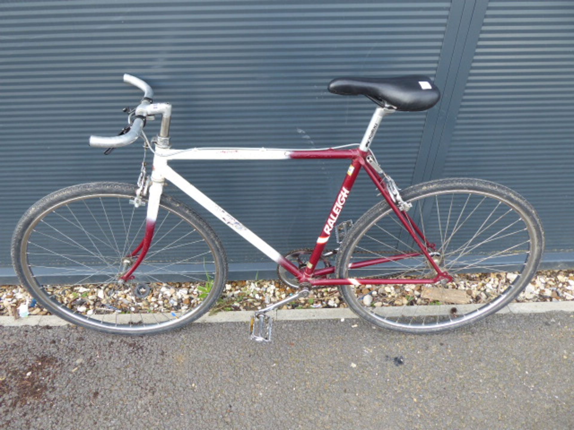 Raleigh white and red single speed vintage racing style cycle