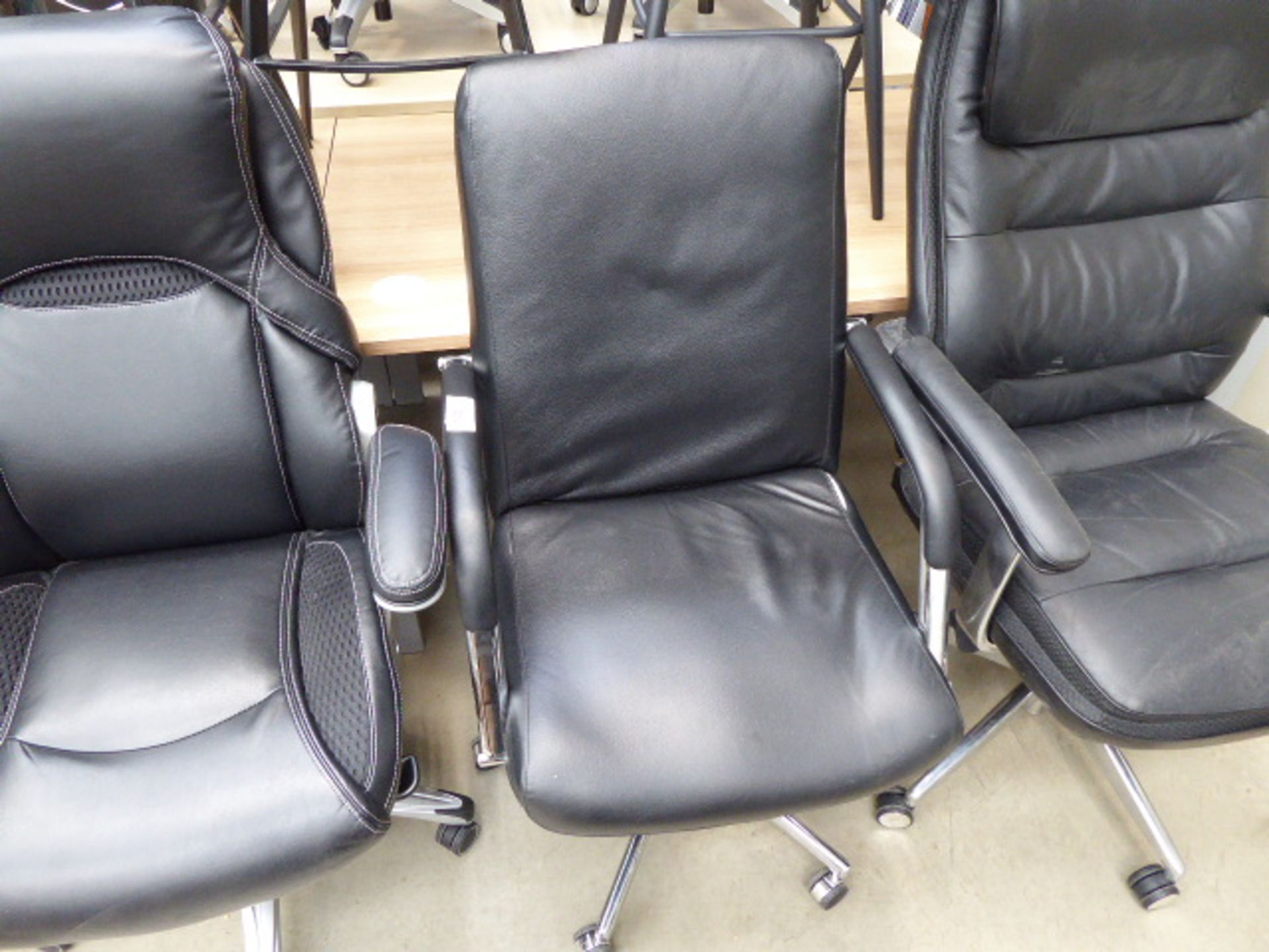 Black high back executive style swivel armchair