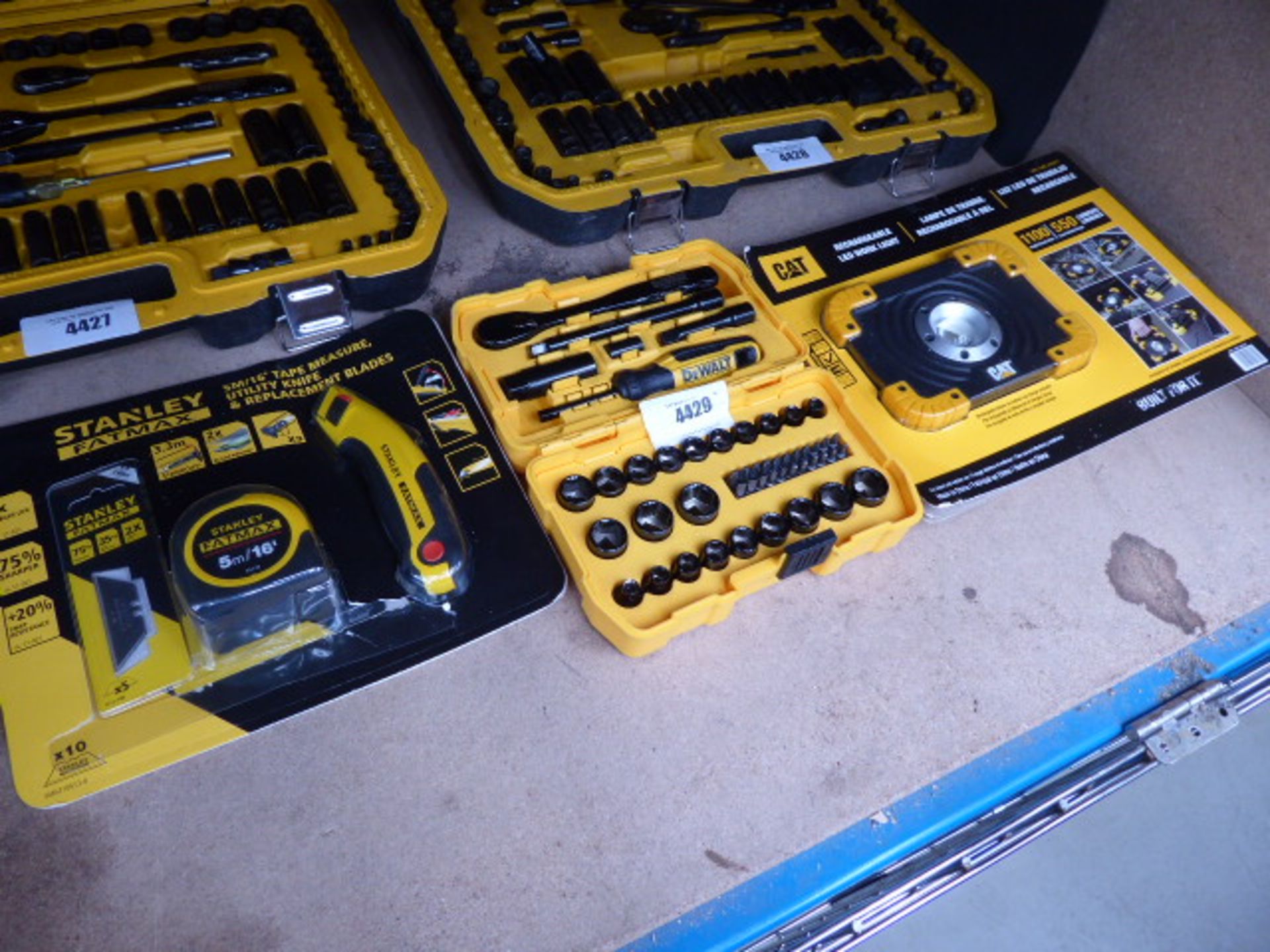 Small Dewalt mini socket set, Cat work light and Stanley tape measure and knife set