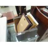 Box containing a picture and photo frames