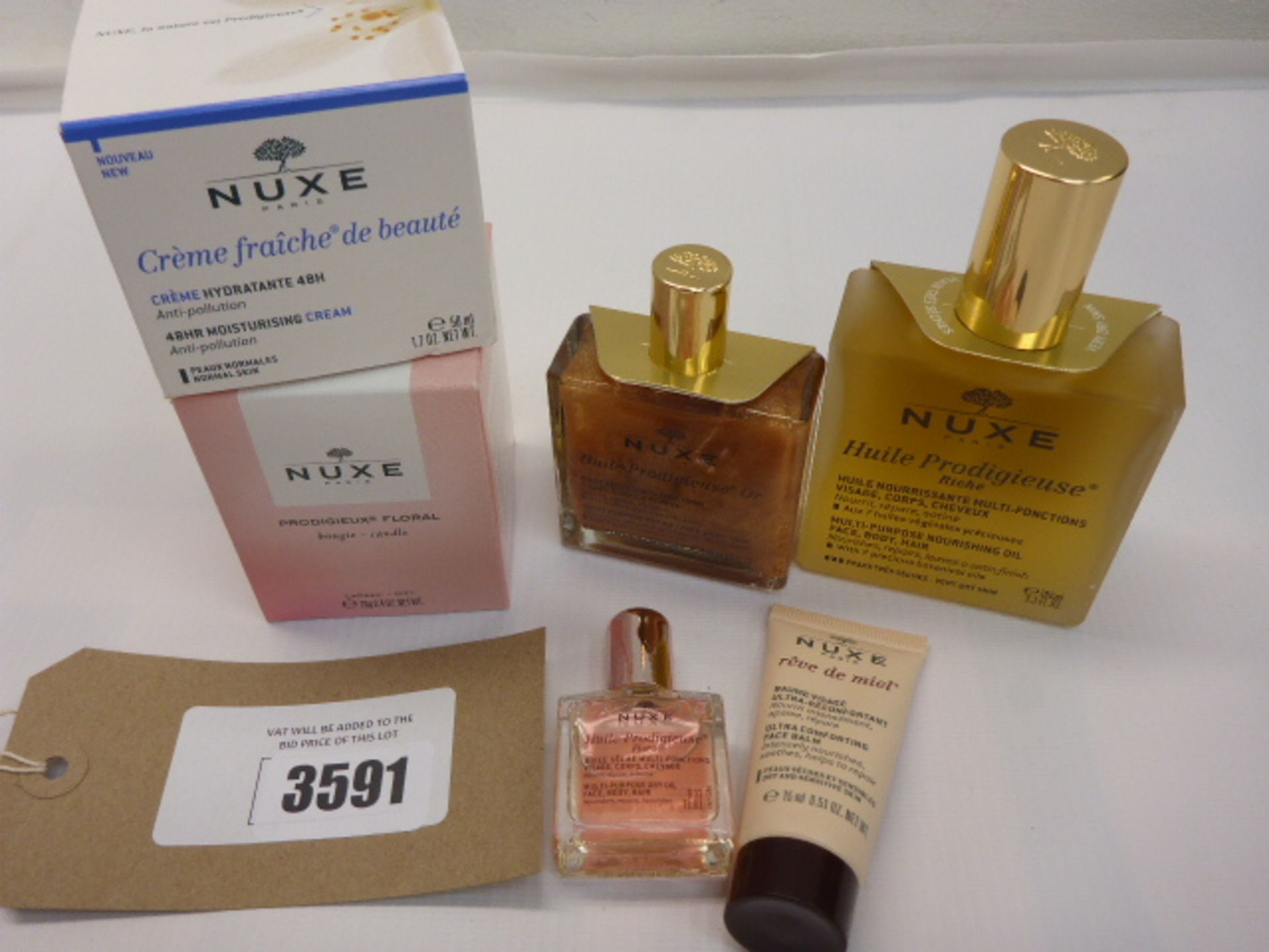 Selection of Nuxe beauty products including hydration cream, nourishing oil, balm etc