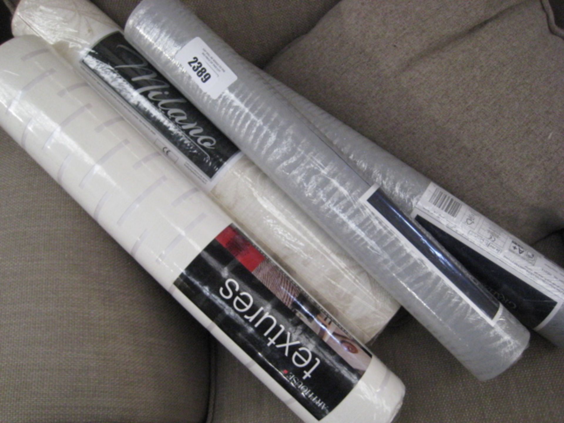 2 rolls of grey wallpaper, 1 roll of Milano and 1 roll of Art House patterned wallpaper