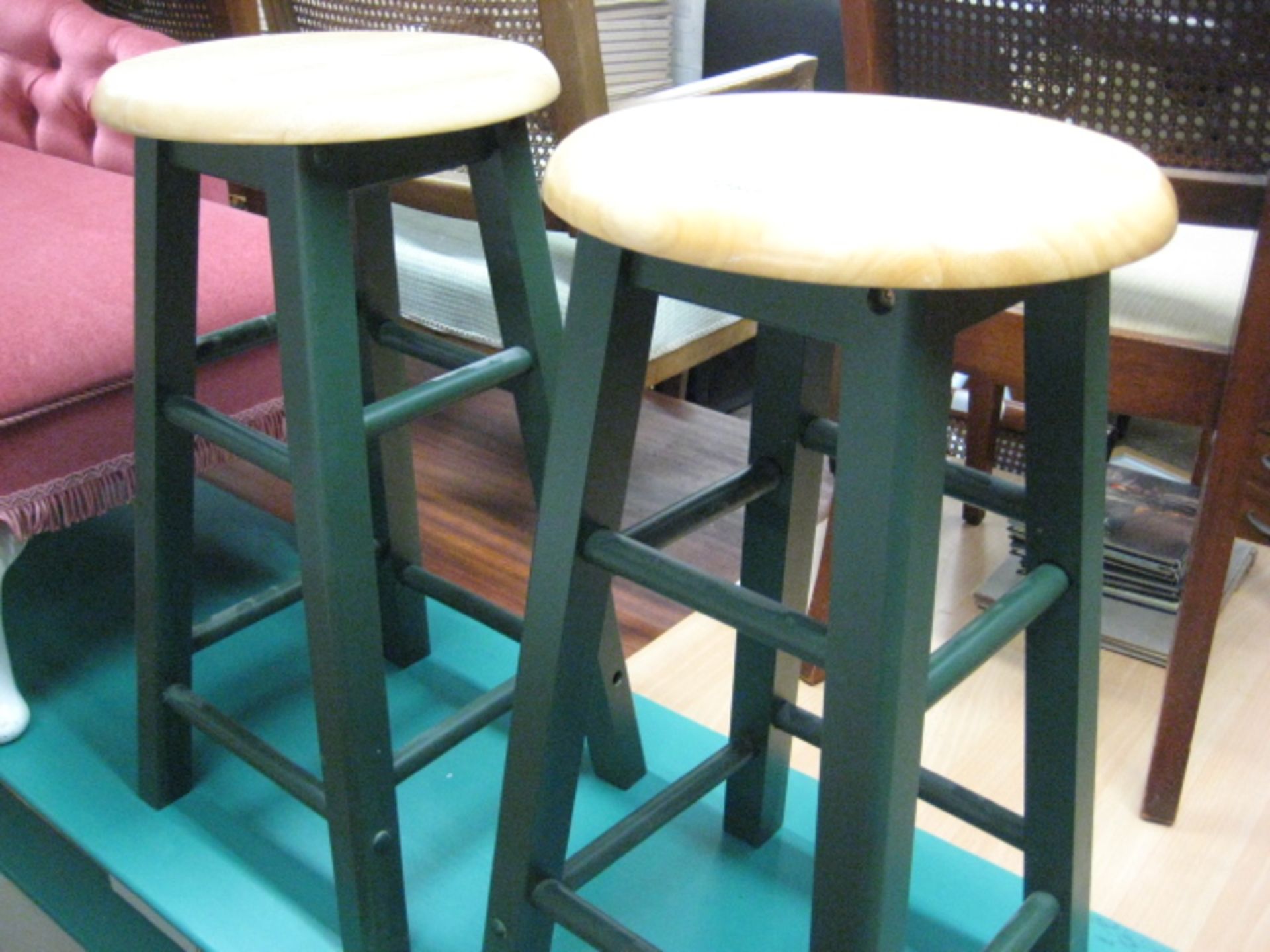 Pair of green painted and pine seated stools