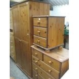 Pine bedroom suite comprising 2 door wardrobe, chest of 2 over 4 drawers and 3 drawer bedside