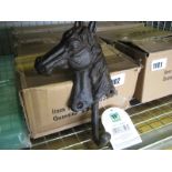 3 boxes containing decorative horse head hooks