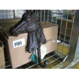 3 boxes containing decorative horse head hooks