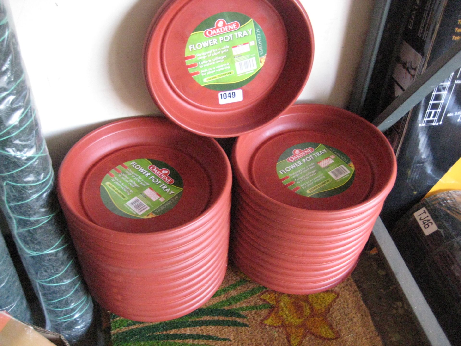 Quantity of circular flower pot trays