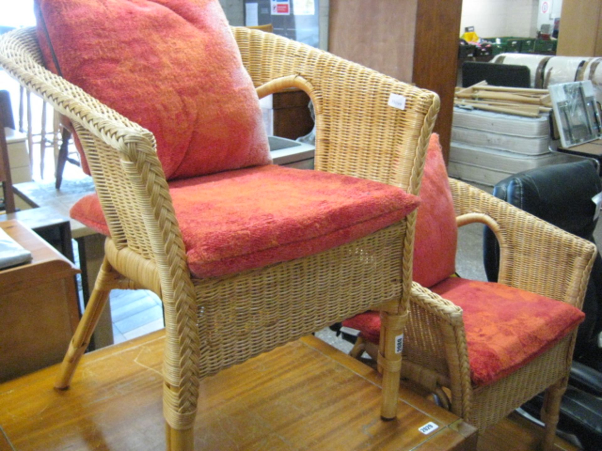 Pair of wicker and bamboo tub chairs with cushions