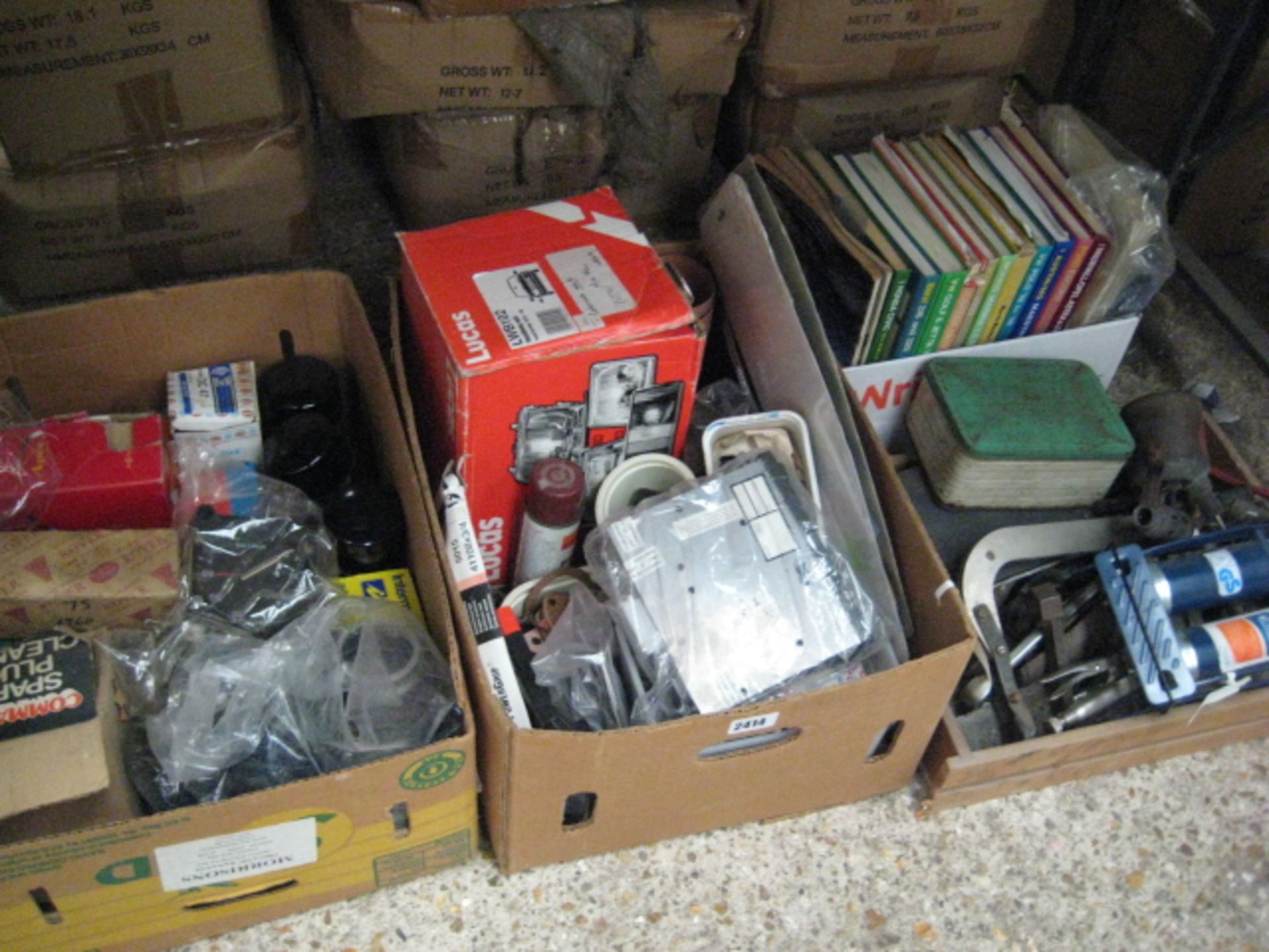 4 boxes of various car parts, car stereo, car manuals, car spares and other tools