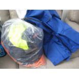 Bag containing 20 pieces of work ware incl. shirts, jackets, coats and waterproof suits