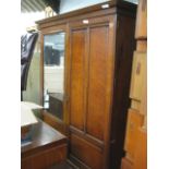 Large mahogany 2 door wardrobe with bevelled mirror panel