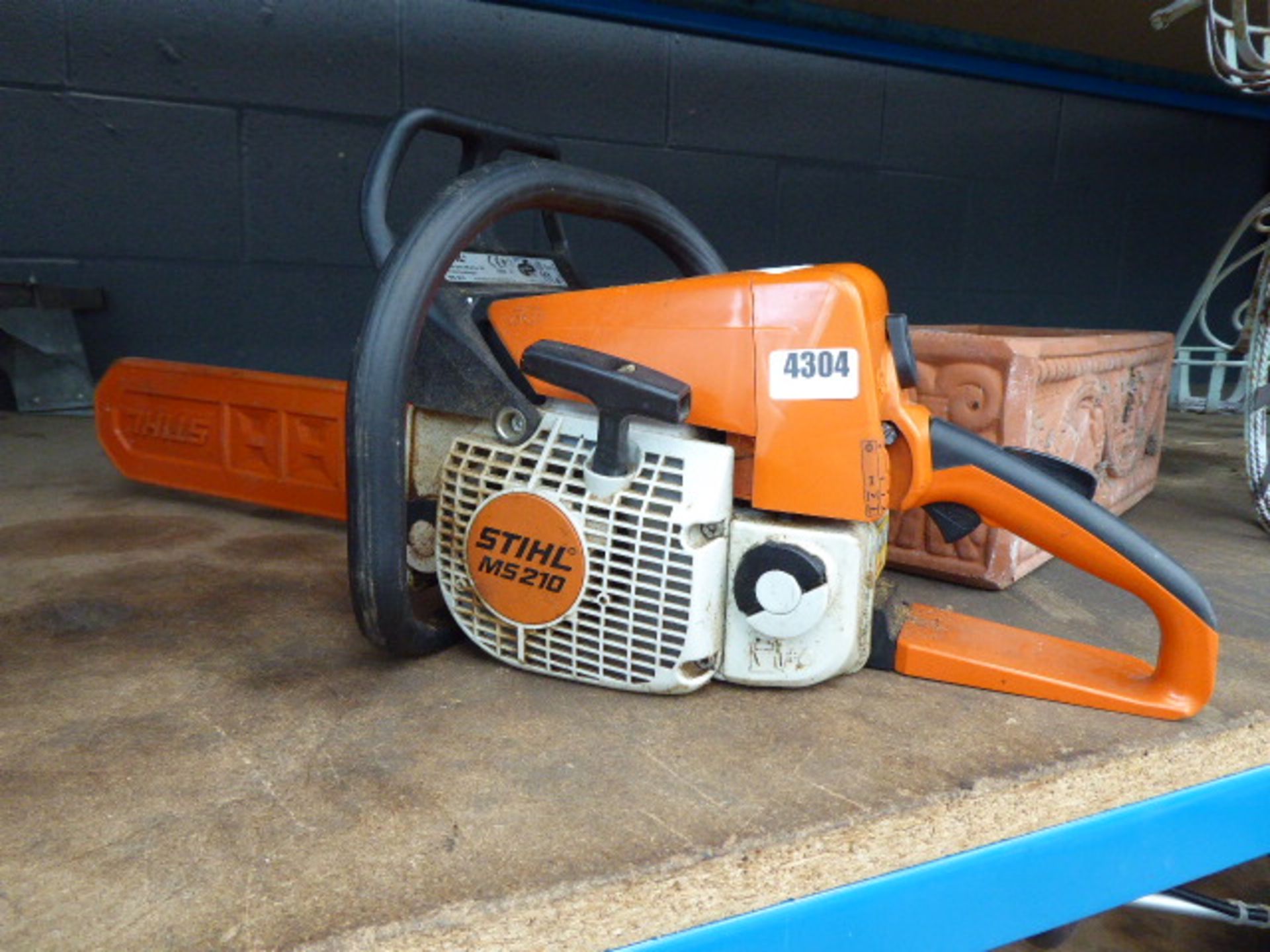 Stihl MS210 petrol powered chainsaw