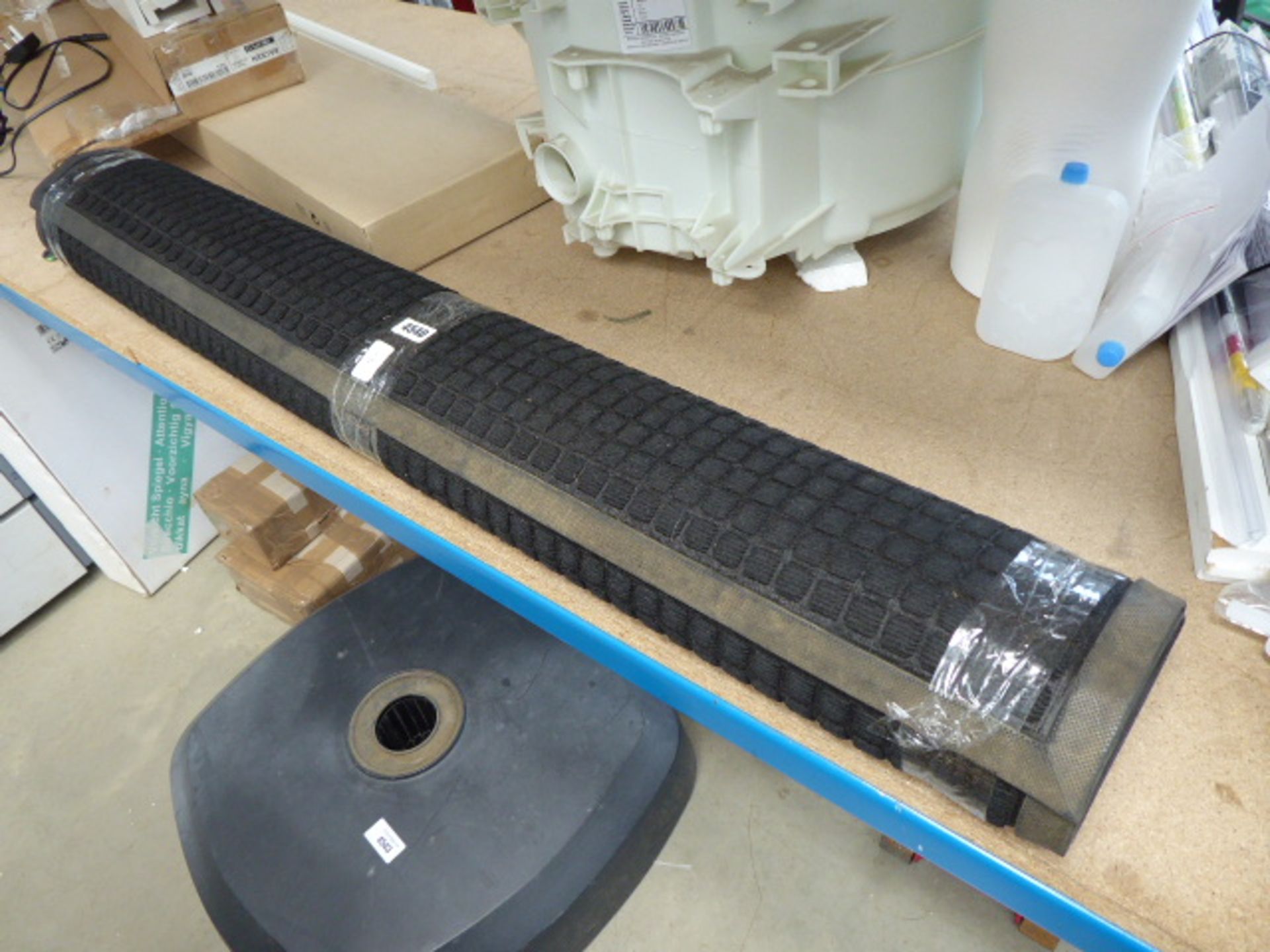 Black rubber backed mat